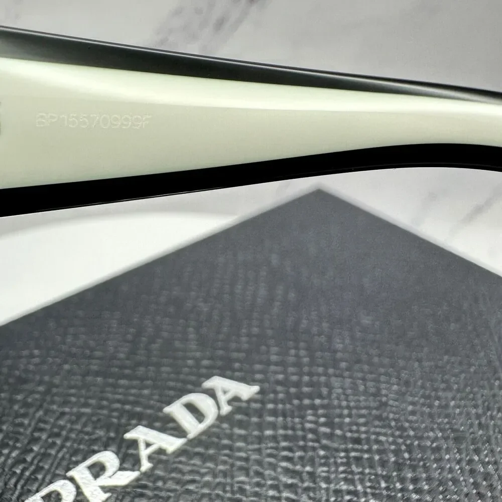 New Prada Sunglasses Womens Black White Symbole Logo Authentic Gold Logo Italy